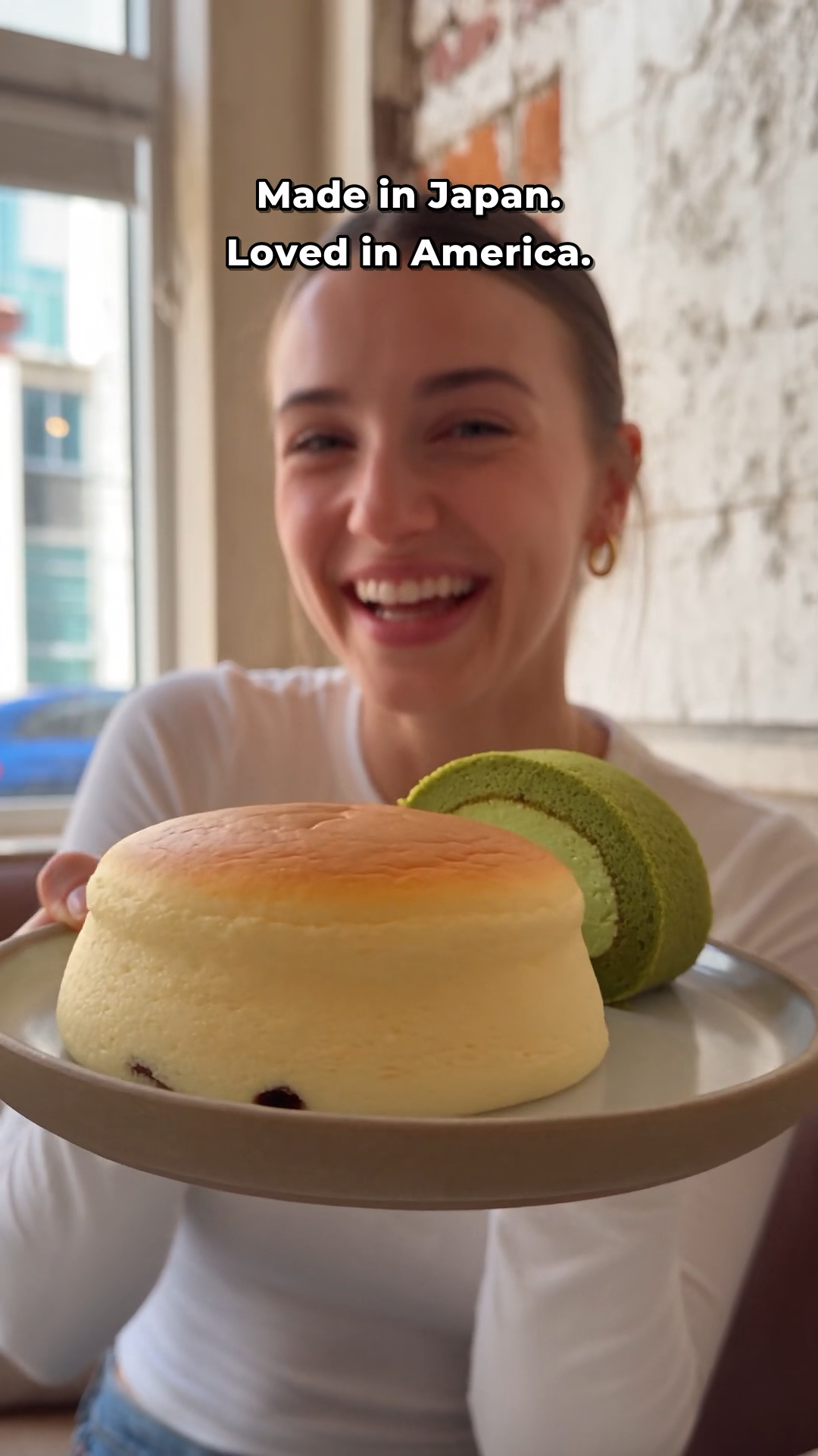 Creator smiling while sharing Japanese fluffy cake and matcha roll cake